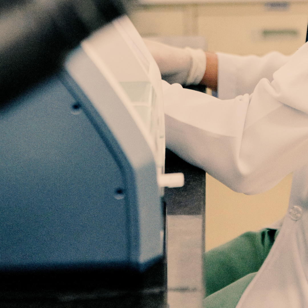 Laboratory technician performing controlled clinical testing